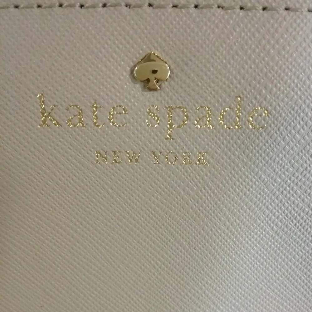 Kate Spade Zippy Liight Purple Wallet